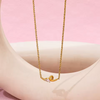 Gold Abstract Ribbon Necklace with Pear-Cut Stone